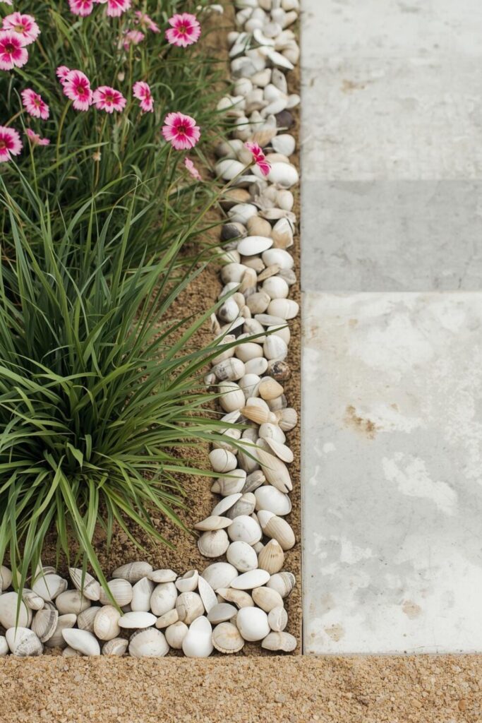 15 Cheap DIY Garden Border Ideas That Look Expensive Shell and sand garden border with beach style