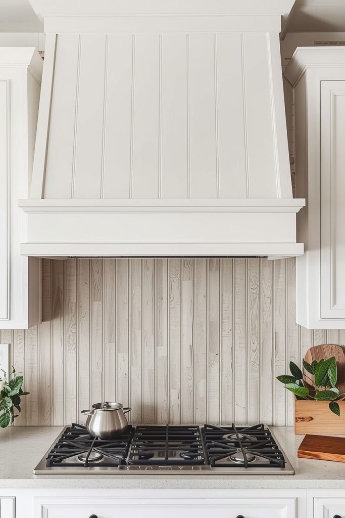"DIY painted beadboard vent hood adding vertical texture"