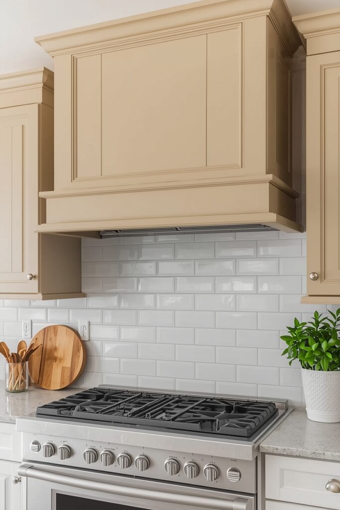 "DIY paneled box painted vent hood with beveled edges"