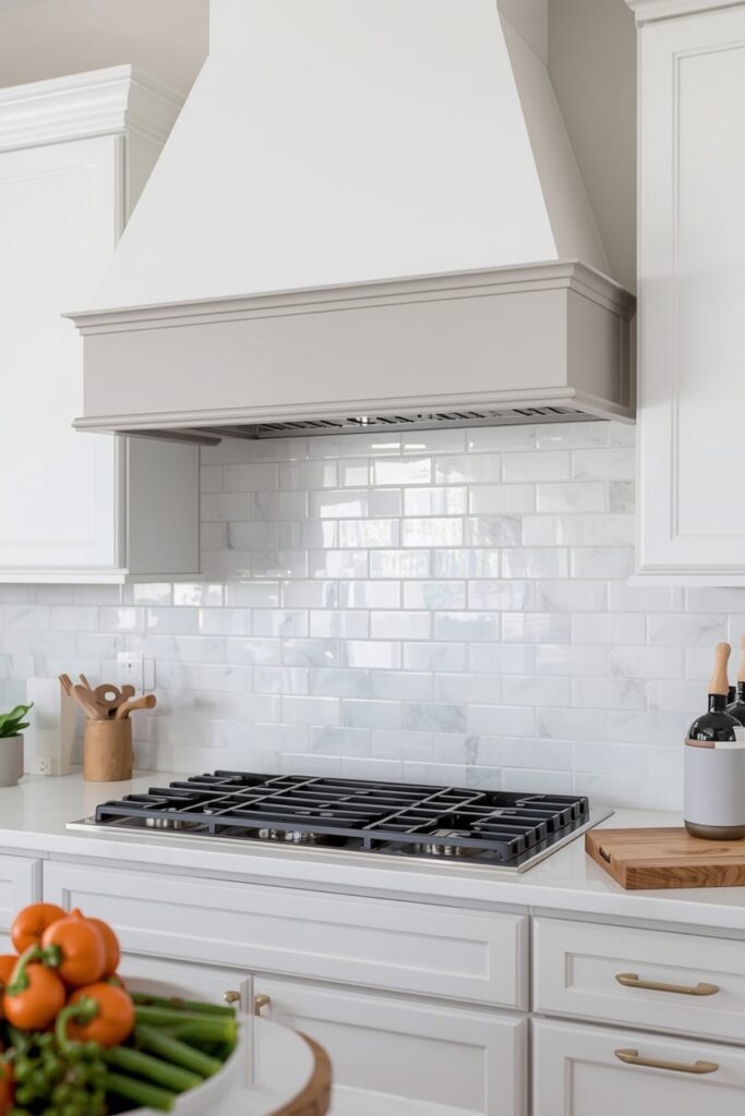 "DIY two-tone painted vent hood in white and grey"