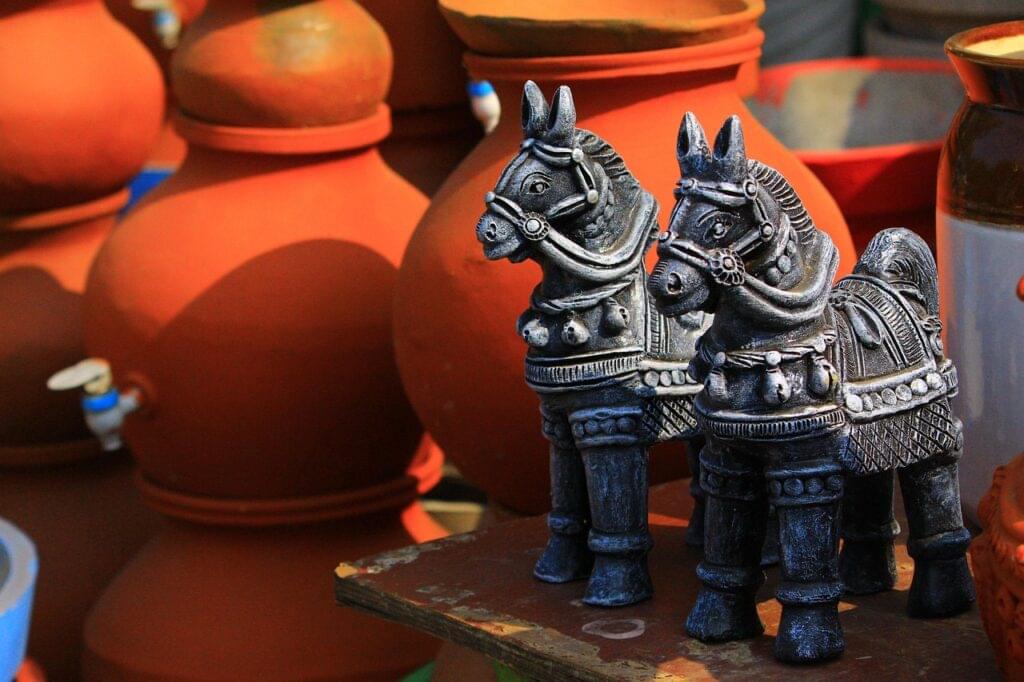 figurines and sculptures on table